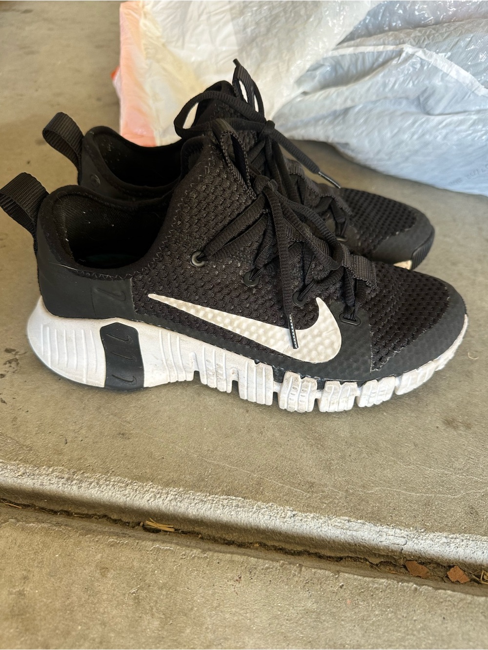Nike Black Athletic Sneakers with White Swoosh